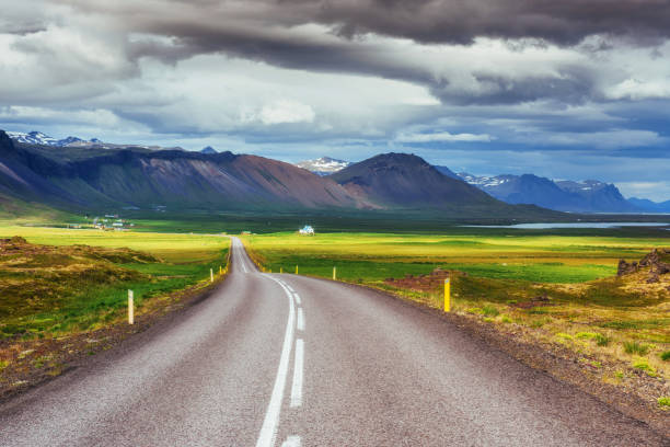 istock Asphalt road to the mountains. Iceland. 843053170
