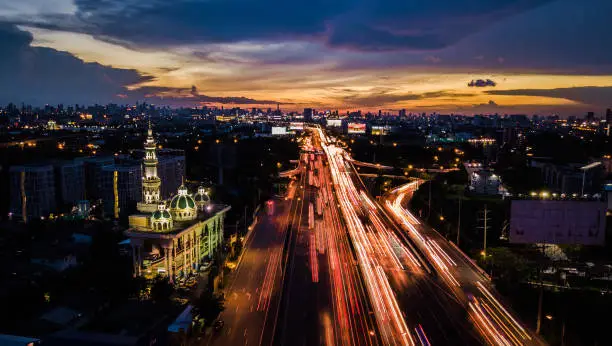 Photo of mosque with road in twilight time