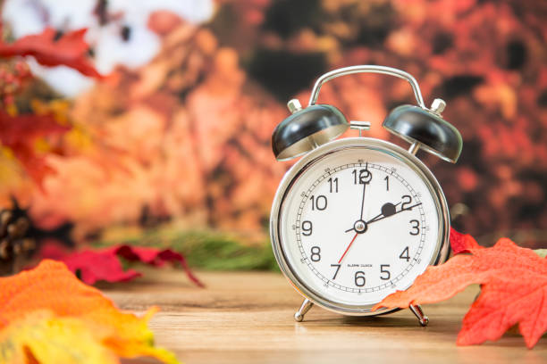 istock Daylight savings time.  2 o'clock time on clock in autumn season. 843056502