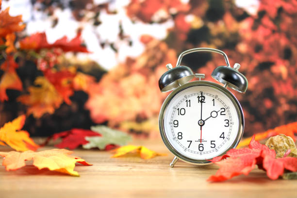 istock Daylight savings time.  2 o'clock time on clock in autumn season. 843056824