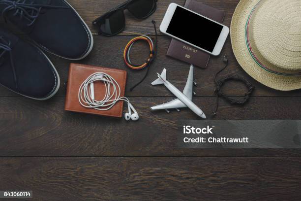 Table Top View Of Essential Item Gentlemen For Travel With Technology Background Conceptmix Variety Object On Modern Rustic Wood Office Deskseveral Accessories For Men Travel To Holidays Trip Stock Photo - Download Image Now