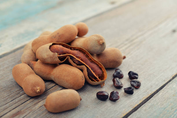 istock Sweet ripe tamarind pods 843061240
