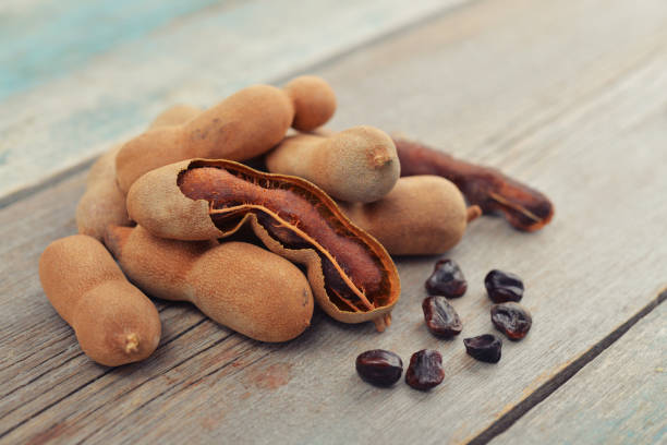 istock Sweet ripe tamarind pods 843061248