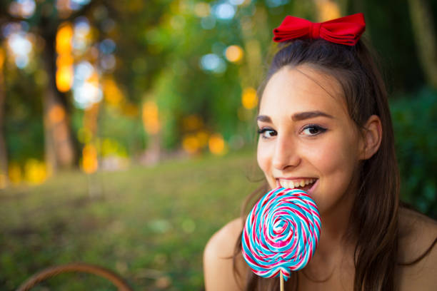 istock Cute Girl with Lollipop 843062132