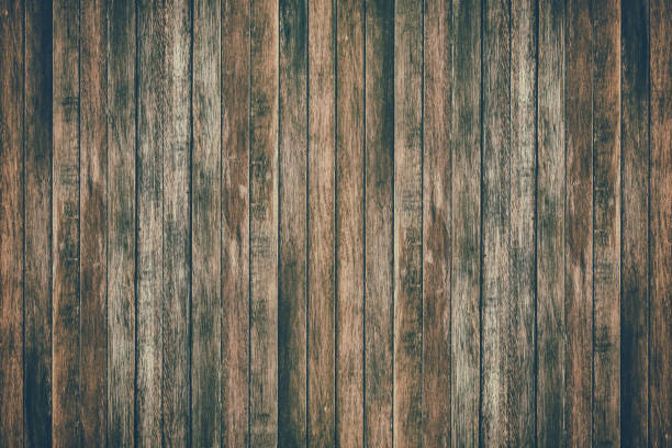 istock Vintage surface wood table and rustic grain texture background. Close up of dark rustic wall made of old wood table planks texture. Rustic brown wood table texture background template for your design. 843071280