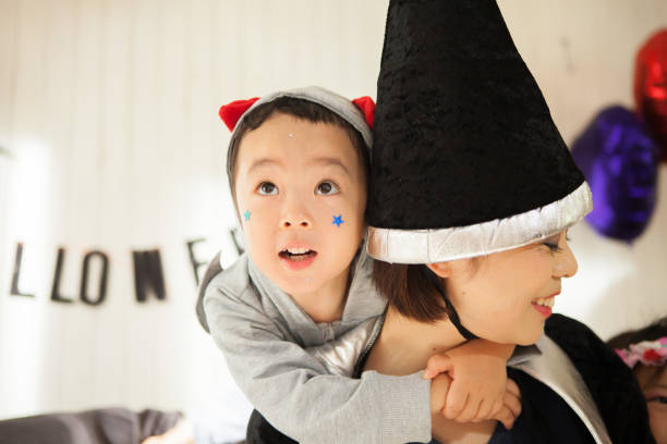 istock A witch labored a mouse at a halloween party. 843072066