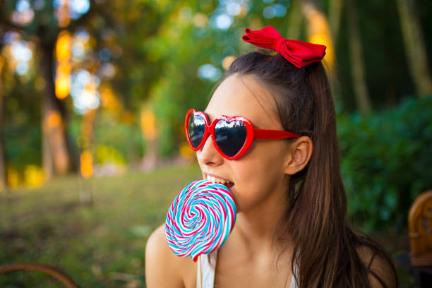 istock Girl and a sugar candy 843074748
