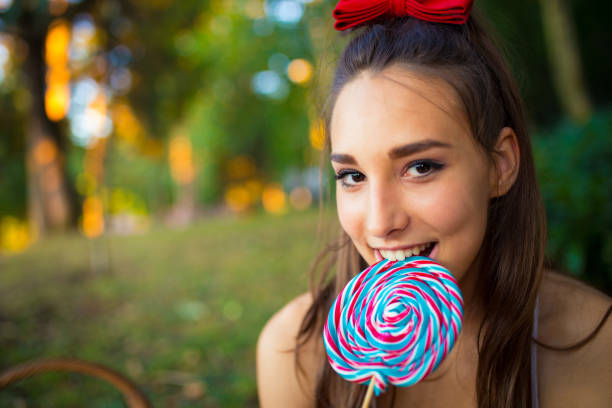 istock Cute Girl with Lollipop 843090150