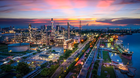 Aerial view of Oil and gas industry - refinery, Shot from drone of Oil refinery and Petrochemical plant  at twilight, Bangkok, Thailand
