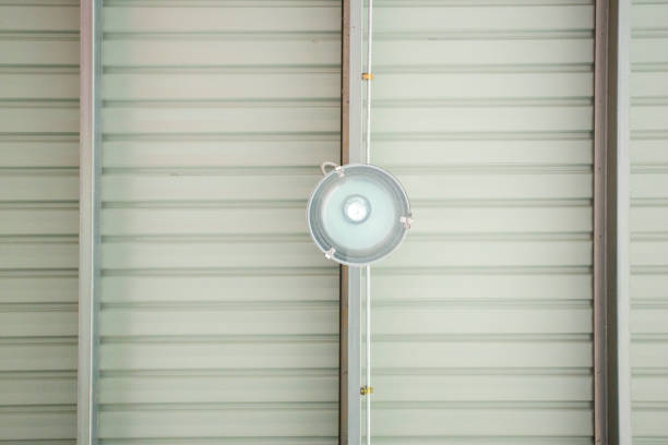 High Bay Led Lighting installing on galvanize purlin under metal roof sheet.