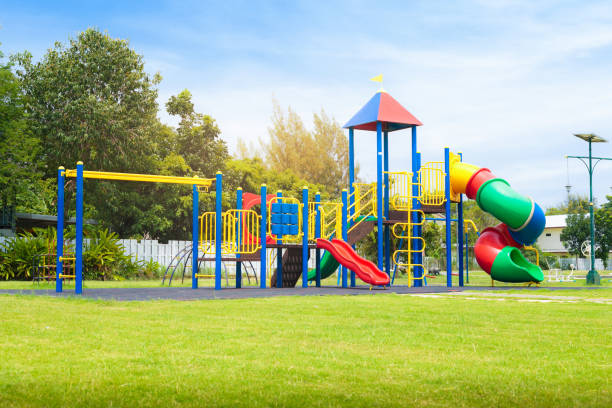 Colorful playground on yard in the park. stock photo
