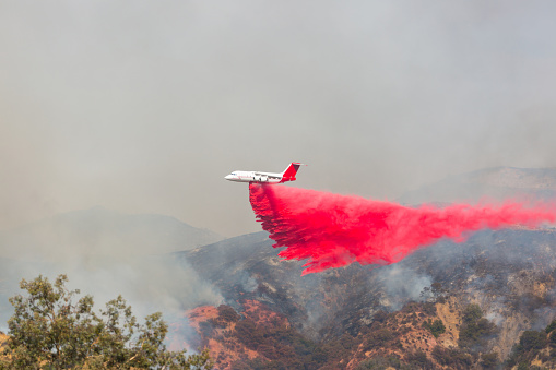 DC-10 flying around doing water and fire retardant drops on the moutains of Los Angeles. \n\n