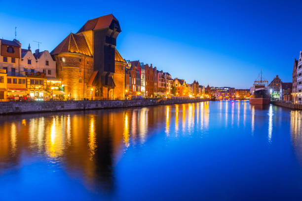 istock Gdansk at night with historic port crane 843118638