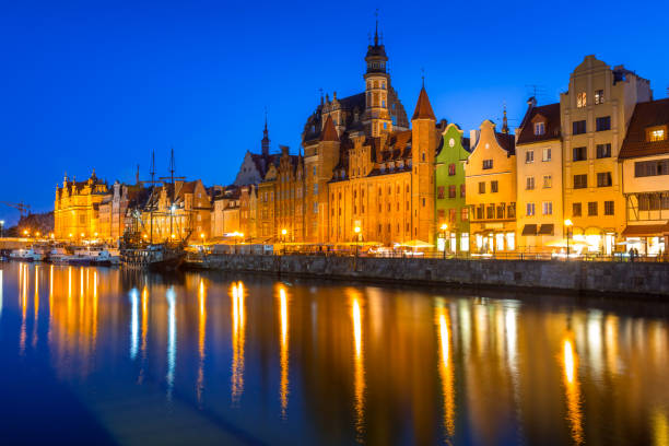 istock Gdansk at night reflected in Motlawa river 843118660
