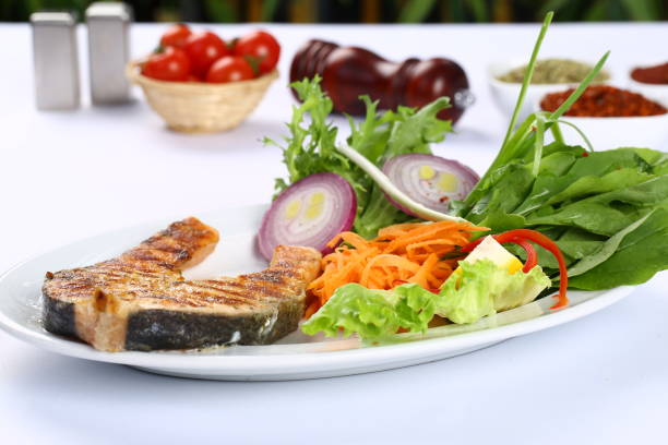 рыбное филе - sea bass prepared fish food grilled стоковы�е фото и изображения