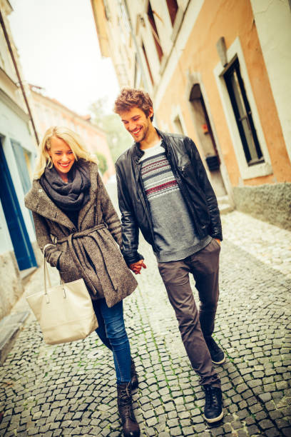 istock Happy couple in love walking embraced 843127872