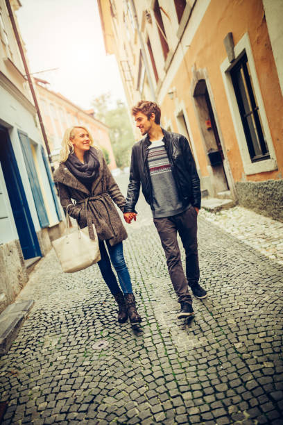 istock Happy couple in love walking embraced 843127880