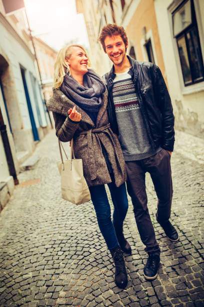 istock Happy couple in love walking embraced 843127886