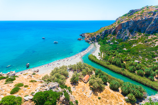 View of Preveli beach at Libyan sea, river and palm forest, southern Crete , Greece