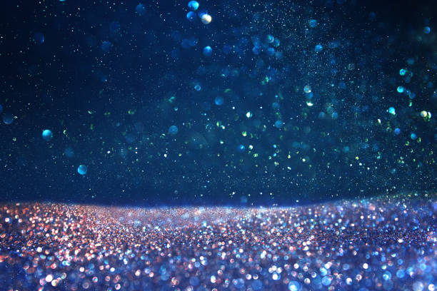 istock glitter vintage lights background. blue, gold and black. de focused 843140304