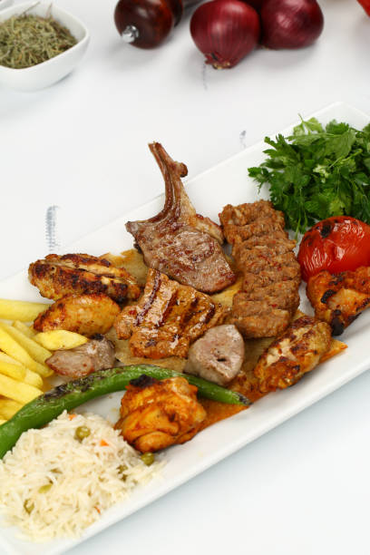 istock Mix kebab with tomato, potetos and green papper 843141236