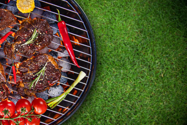 istock Barbecue grill with beef steaks, close-up 843156468