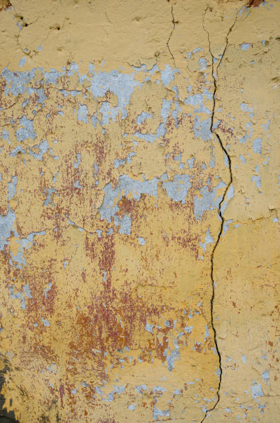 istock Abstract background of cracked yellow paint 843163602
