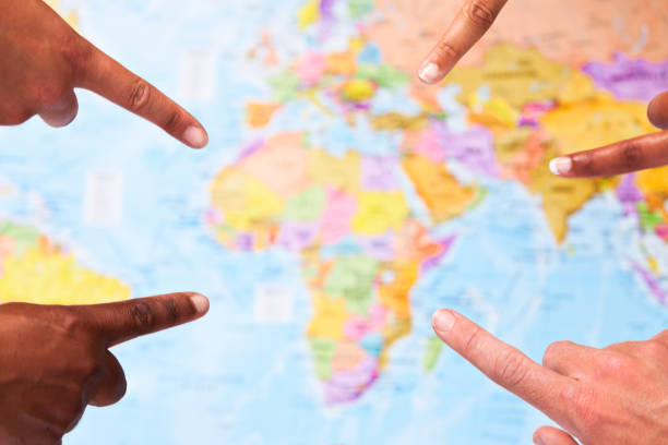 istock Five fingers point out Africa on world map 843163668