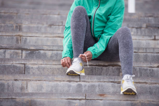 istock Shoelace tying of running shoes. 843166474