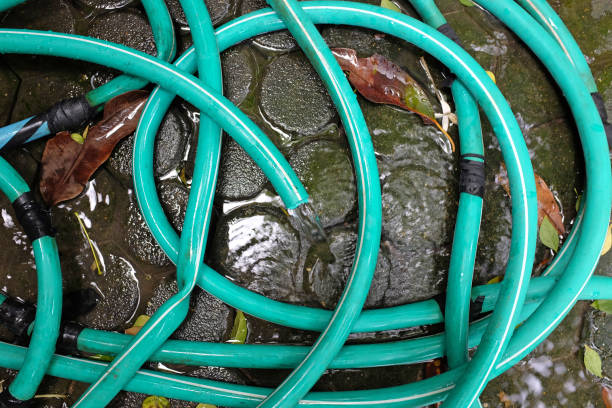 istock Water flow or leaking on floor by rubber tube. 843170150