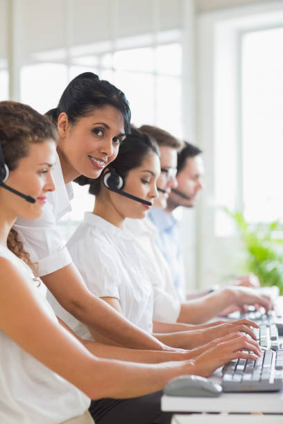 istock Manager assisting staffs in call center 843173222