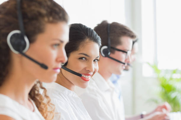 istock Smiling businesswoman working in call center 843173326