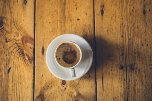 istock Empty cup of coffee on wooden table 843180476