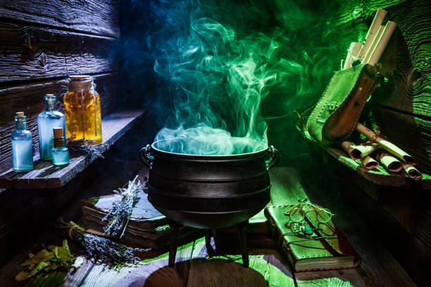 witcher cauldron with color smoke for halloween - alchemist imagens e fotografias de stock