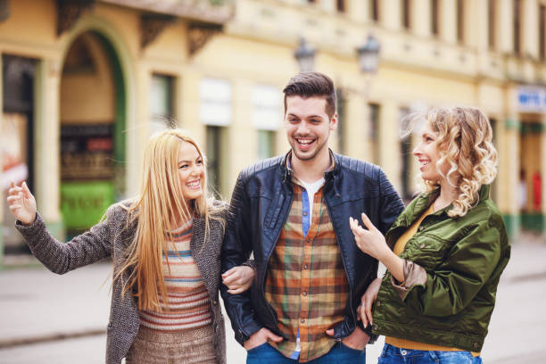 istock Group of friends spending autumn day in downtown. 843182250