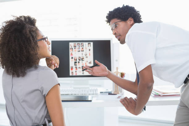 istock Young editorial team working together at desk 843189232