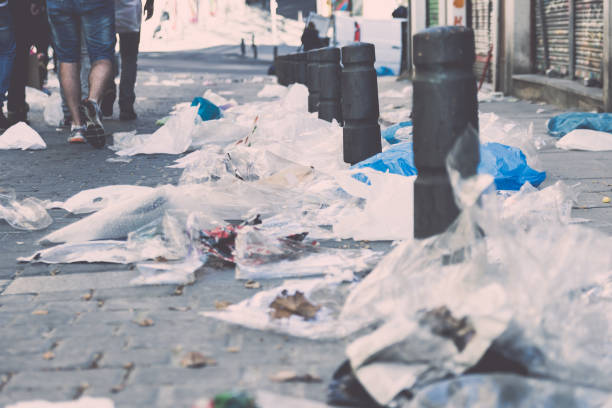 istock Garbage Plastic Bags on Sidewalk in Madrid after Marketplace 843192784