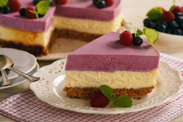 istock Homemade cheesecake with berry mousse. 843198024