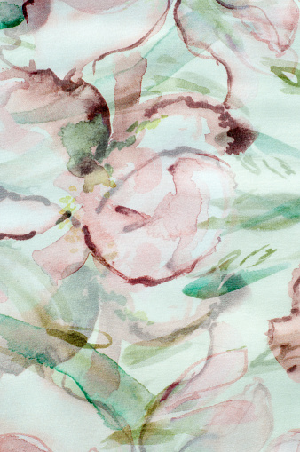 Fabric silk texture, abstract flowers drawn on the fabric