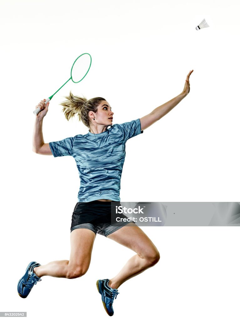 young teenager girl woman Badminton player isolated one caucasian young teenager girl woman playing  Badminton player isolated on white background Badminton - Sport Stock Photo