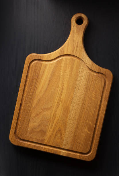 istock Pizza cutting board at wooden background 843206312