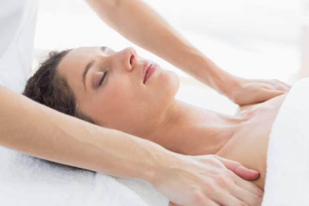 istock Woman receiving shoulder massage 843209260