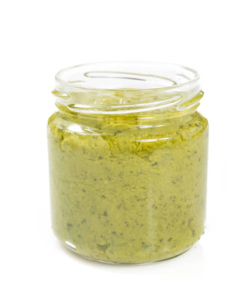 istock Pesto sauce on white background 843209958