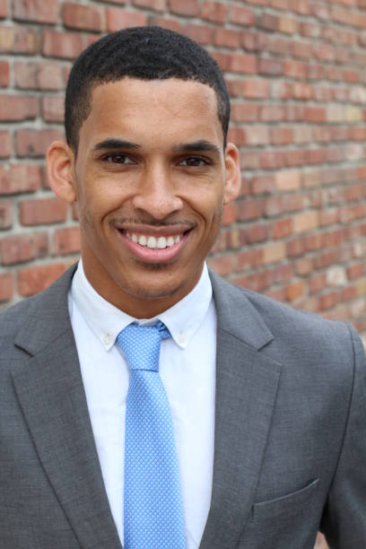 istock Smiley businessman with a full suit 843214438