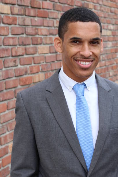 istock Handsome businessman smiling isolated 843214598