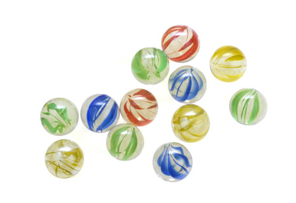Colorful glass marbles Colorful glass marbles isolated on white background marble sphere stock pictures, royalty-free photos & images