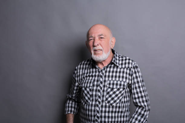 istock Mature man expressing disgust, grimacing 843221912