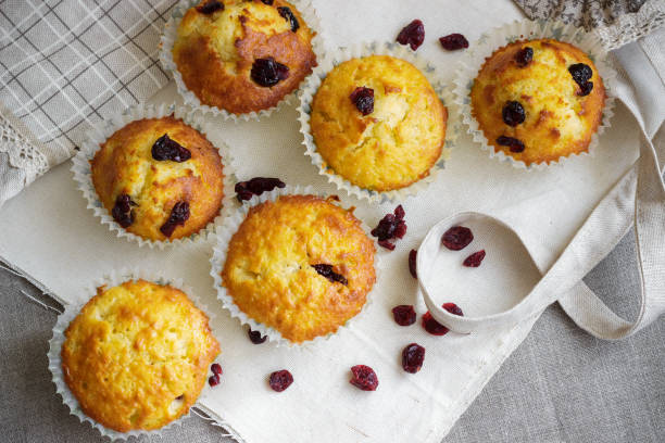 istock Homemade muffins with raisins on the burlap cloth 843225228