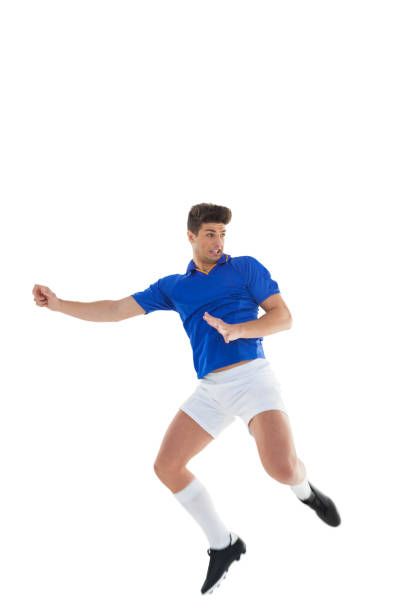 istock Football player in blue jersey jumping 843230308