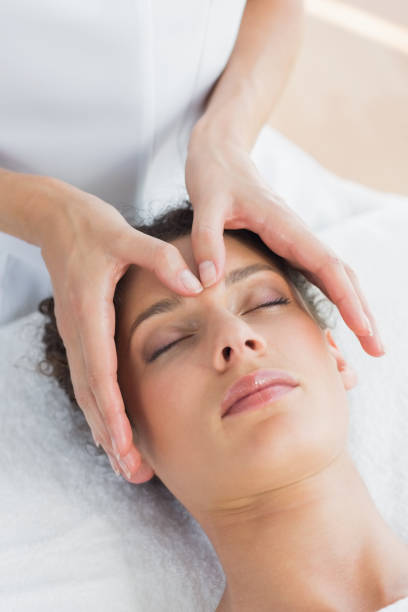 istock Woman having head massage in spa 843237272